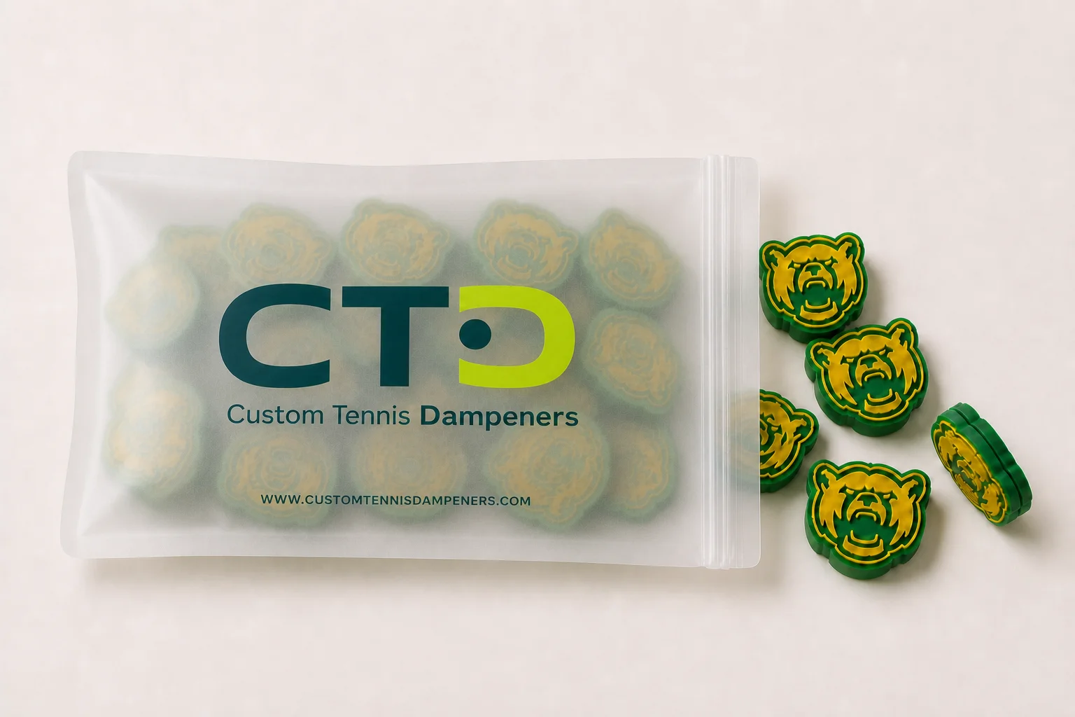 A finished custom tennis dampener order packed in a Custom Tennis Dampeners bag