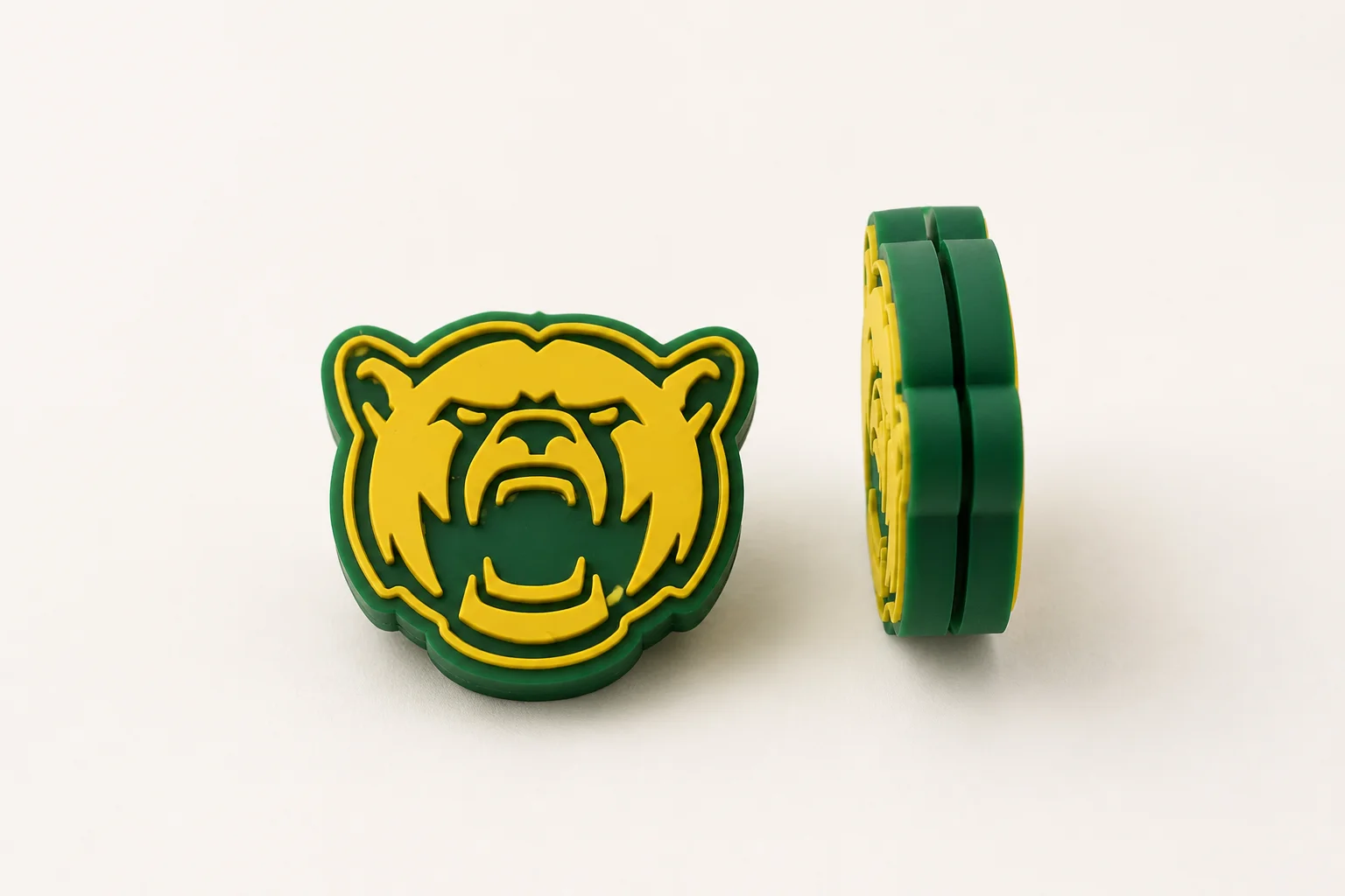 Physical green and gold Baylor Bears custom tennis dampener samples