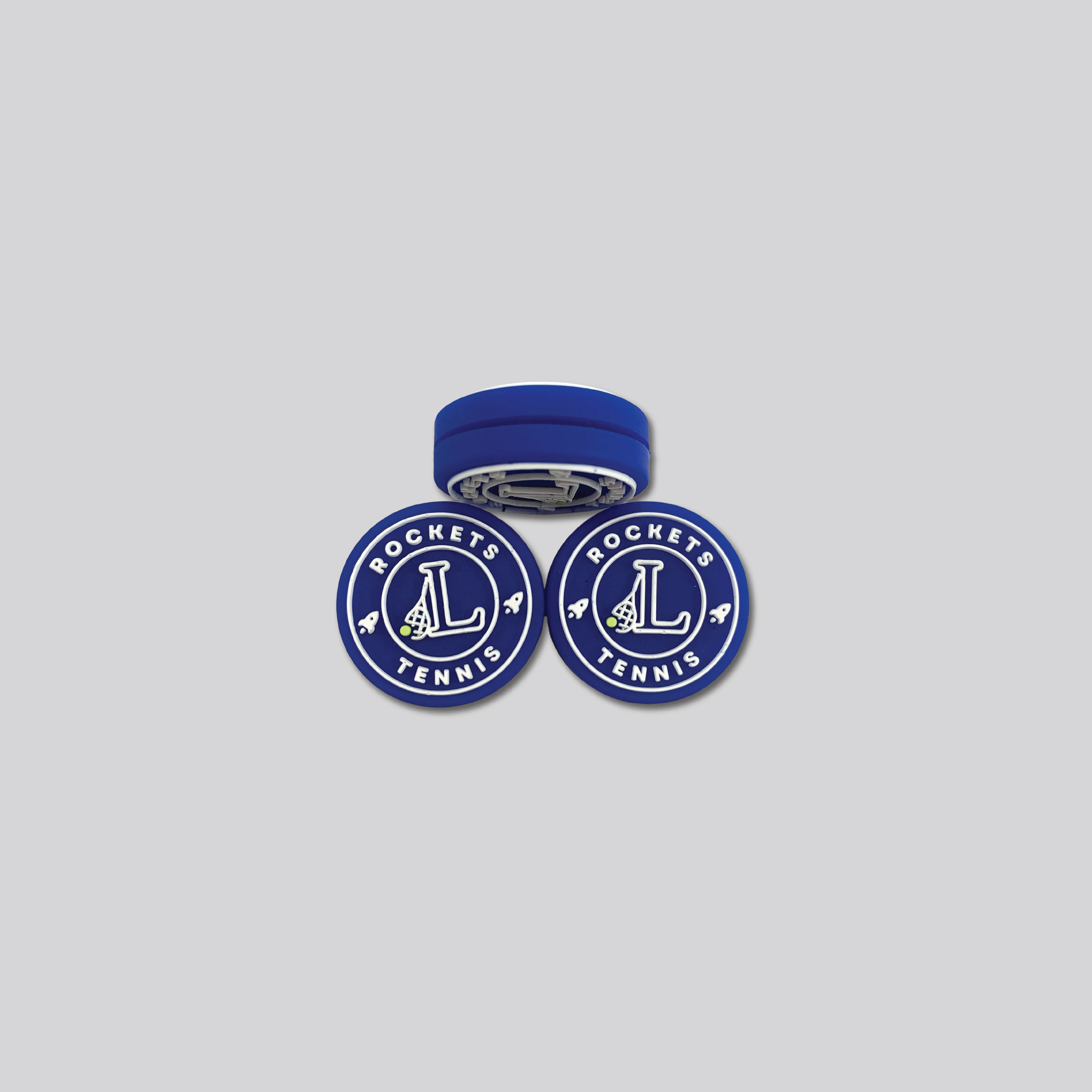 Rockets Tennis custom dampeners with a raised school mark